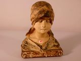 a statue of a woman with a turban on her head