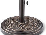 a close up of a metal umbrella stand on a white background