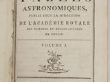 un livre ouvert sur lequel figure l'image d'un homme à cheval