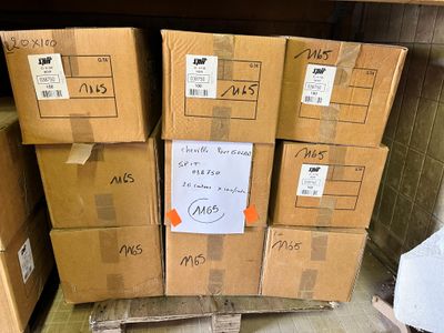 many boxes stacked on top of each other on a pallet