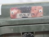 a close up of a license plate on a military vehicle