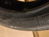 an image of a close up of a tire on a wooden floor