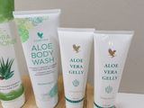 many different types of aloe vera gels on a cutting board