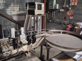 an image of a machine that is working on a piece of paper