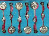 a lot of spoons that are in a box
