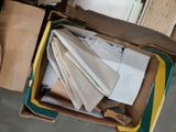 a box full of papers sitting on the floor