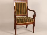 an image of a wooden chair with a striped upholstered seat