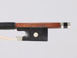 violin bow made of wood and metal with a wooden handle