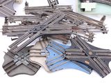 a lot of train tracks that are laying on the ground