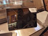 a picture of a broken laptop on a desk