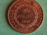 a penny that is sitting on a green surface