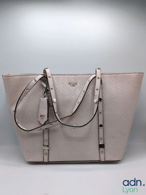 a close up of a purse with a strap on it