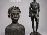 deux statues en bronze représentant un homme et une femme, dont l'une se tient à côté de l'autre