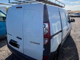 a white van that is parked in a parking lot