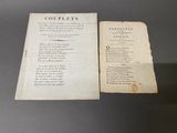 an old book with a couple of pages sitting on top of a table