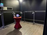 a red table in the middle of a room