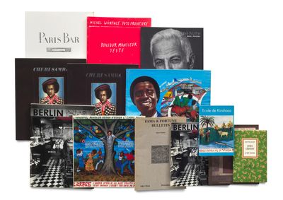 a lot of books that are sitting on a table