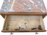 a marble top table with a drawer underneath it