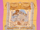 an image of a yellow scarf with a picture of a castle on it