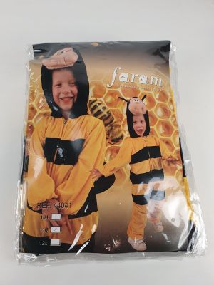 two children in bee costumes standing next to each other on a table