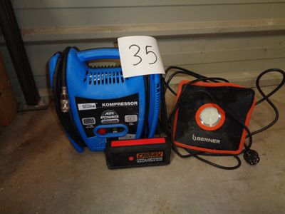un compresseur d'air bleu et noir à côté d'un sac noir et orange