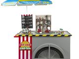 un chariot avec un hot-dog sur roulettes et un parapluie