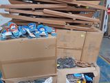many cardboard boxes stacked on top of each other