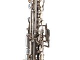 a close up of a silver saxophone on a white background