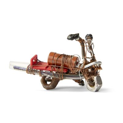 a scooter with a basket on the back of it