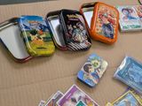 many different types of pokemon tins on the table