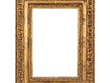 an old gold frame with a decorative pattern on a white background