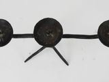 a pair of metal objects that are on a wall