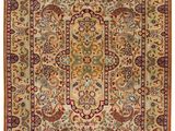 an antique persian rug with a floral design on a beige ground