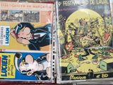 many comic books on the table together on the table