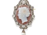 an old cut diamond and pearl cameo broochle