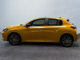 the yellow car is parked in the parking lot on a cloudy day
