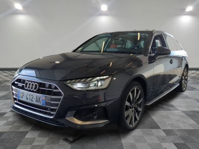 audi ' s new all - wheel drive suv is parked in a showroom