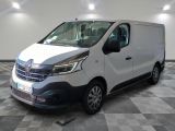 the white van is parked on a checkered floor in a room