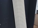a radiator that is sitting on the floor next to a wall