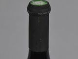 a bottle of wine that is sitting on a table
