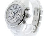 a close up of a watch on a white background