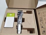 a box that has a pen in it and a notepad in it
