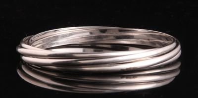 Bracelet cinq joncs rigides en argent. - Photo 1