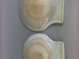 two cups of coffee that are sitting on a table
