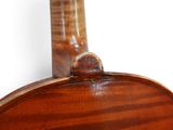a close up of a violin neck with a white background