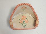 a small tray with a flower design on it