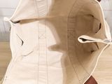 a bag that is sitting on top of a wooden table
