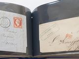 a open book with a picture of a couple of stamps on it