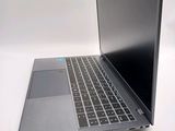 a laptop that is sitting on a white table