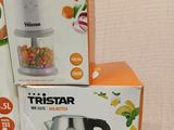 three boxes of tristar food processors stacked on top of each other
